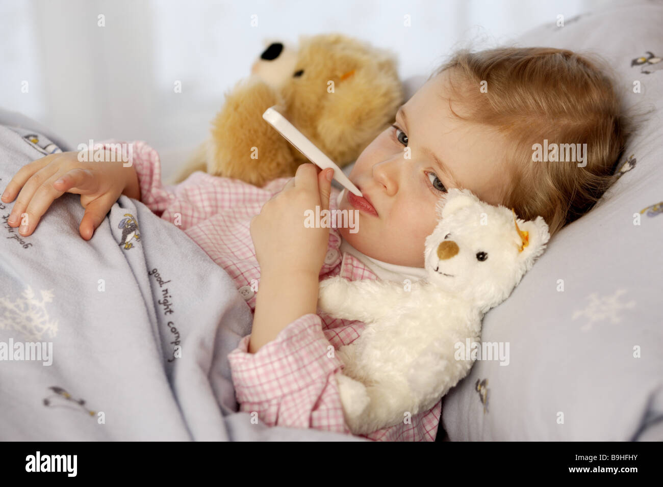 girl  sick  bed  lie  fever-fairs  portrait  lateral Stock Photo