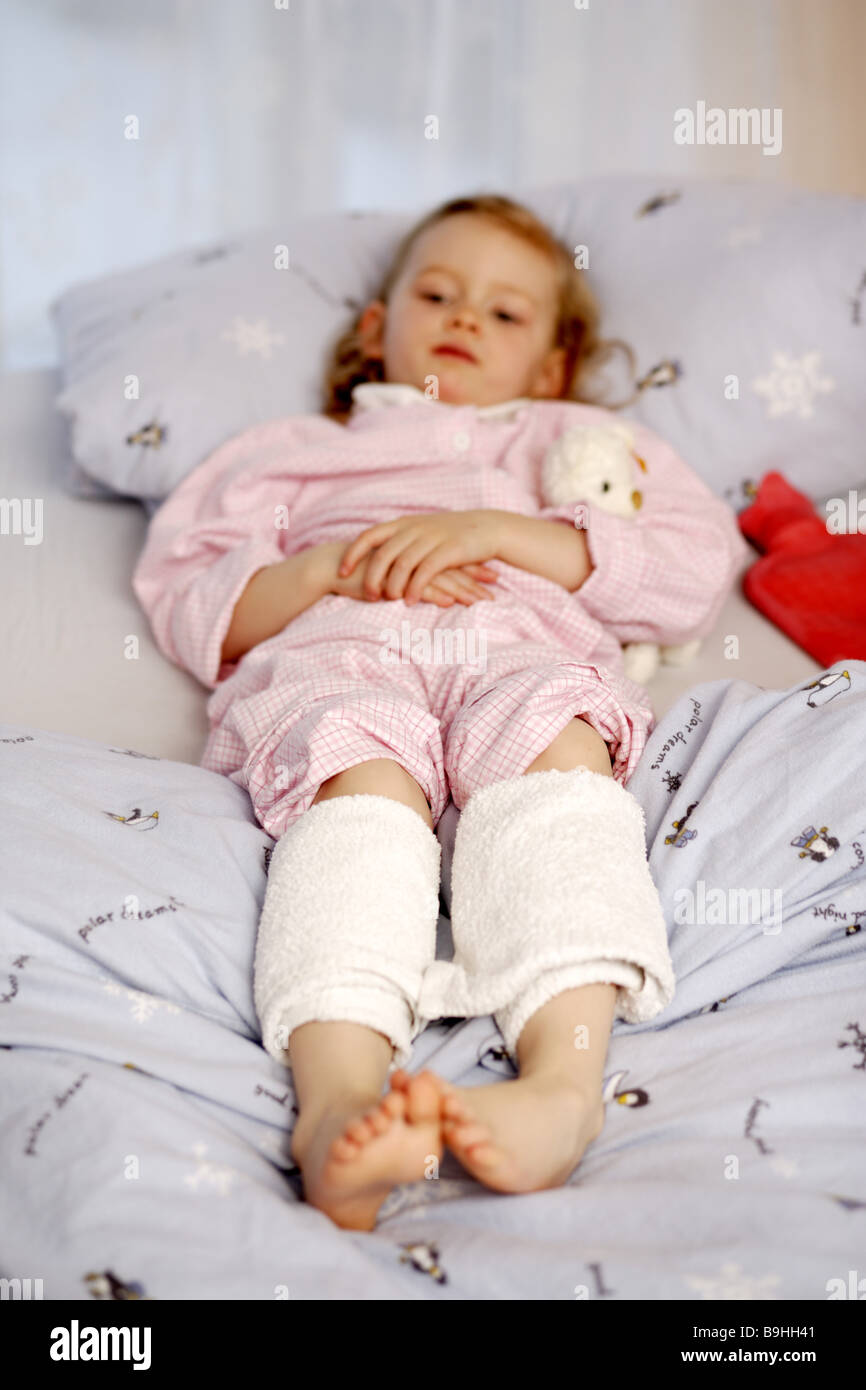 girl  sick  bed  lie  calf packing Stock Photo