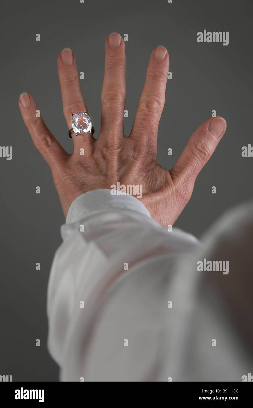 Female hand with diamond ring Stock Photo