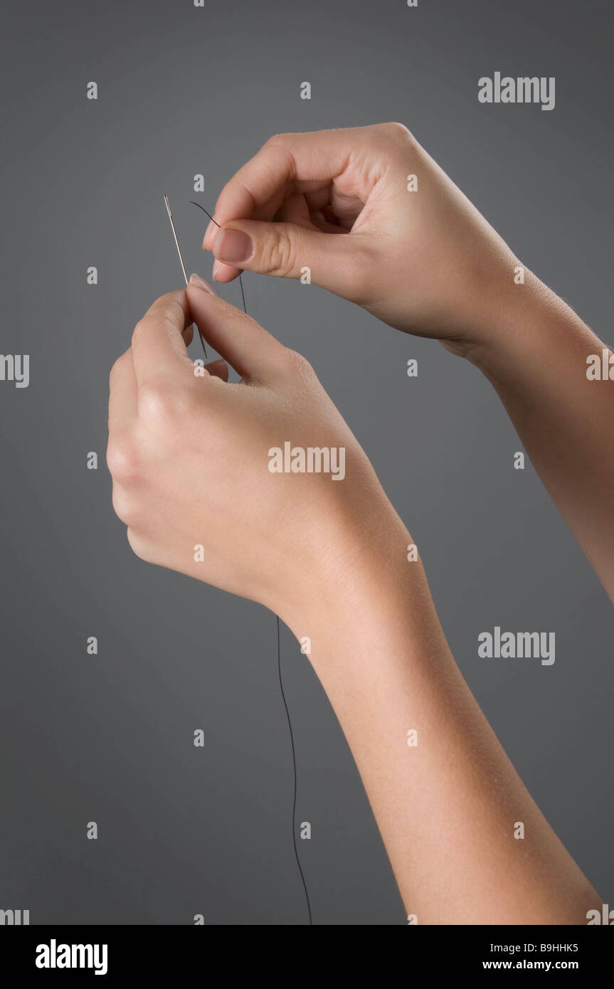 Threading needle thread hires stock photography and images Alamy