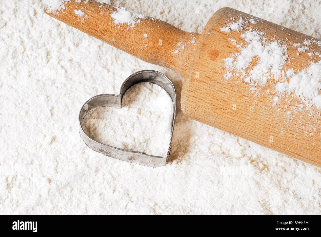 Rolling pin with flour and biscuit cutter Stock Photo Alamy