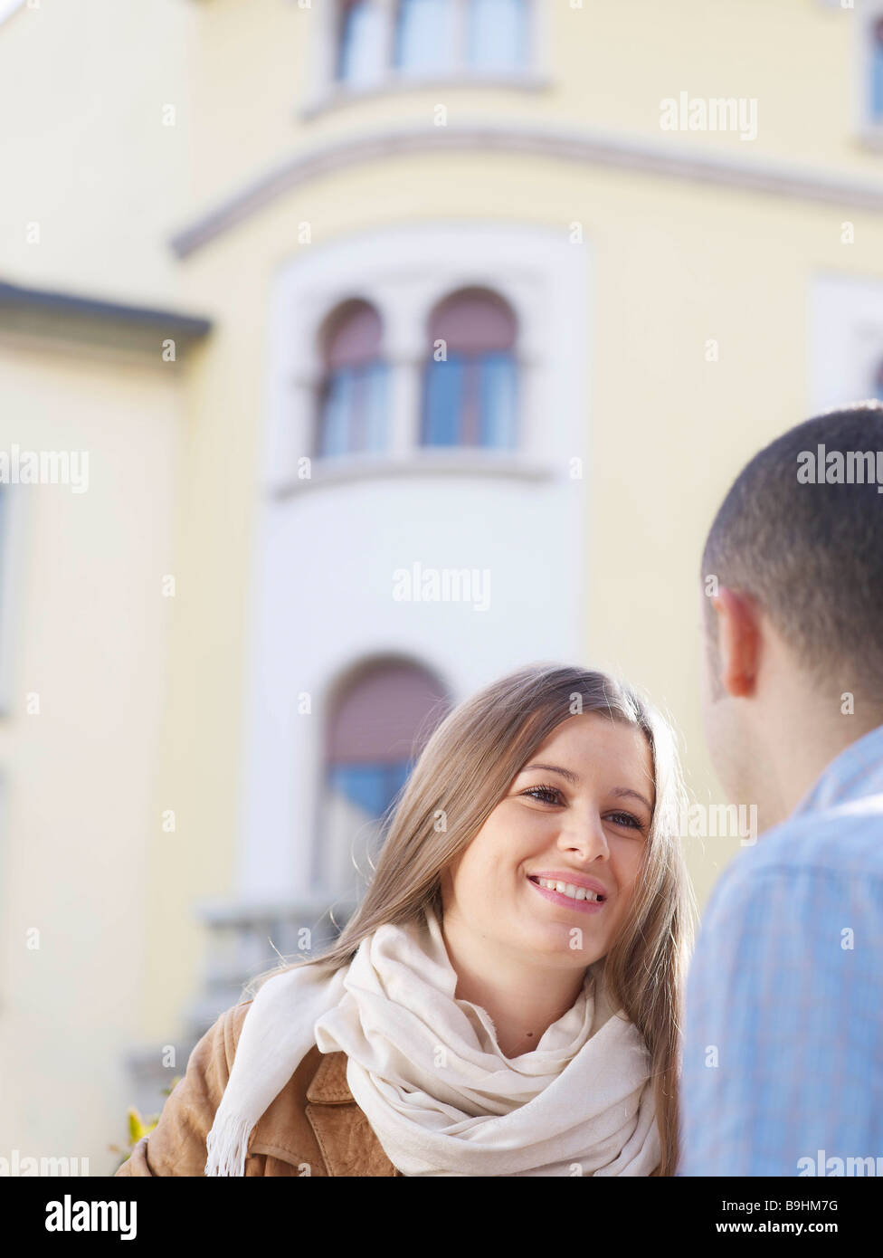 Young couple in a european street Stock Photo