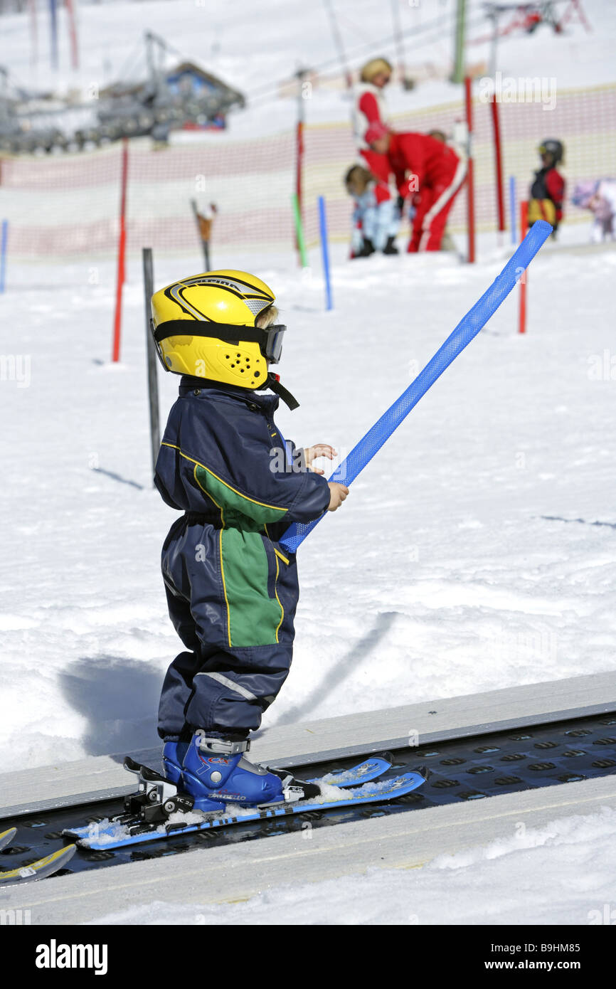 Child ski course pole elevator Beginners glasses vacation helmet child