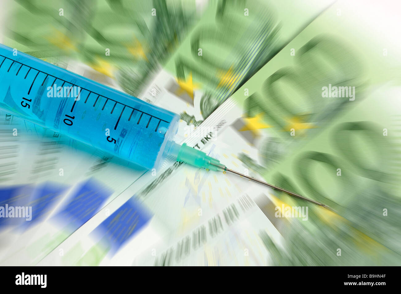 Injection needle on banknotes, symbolic picture for cash injection Stock Photo