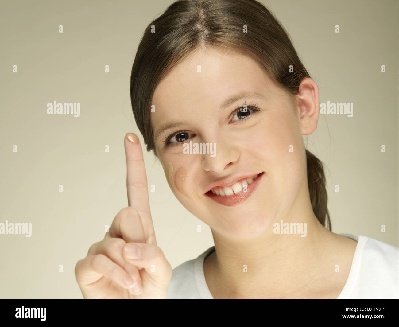 Teenagers girl test make up tone makeup gesture index fingers portrait