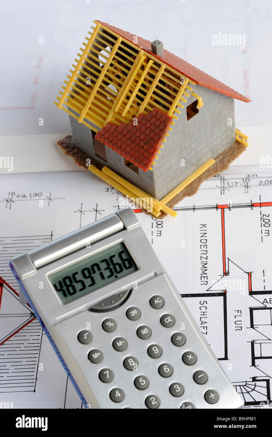 Miniature house, construction plan, calculator, red pencil, symbolic picture for home ownership Stock Photo