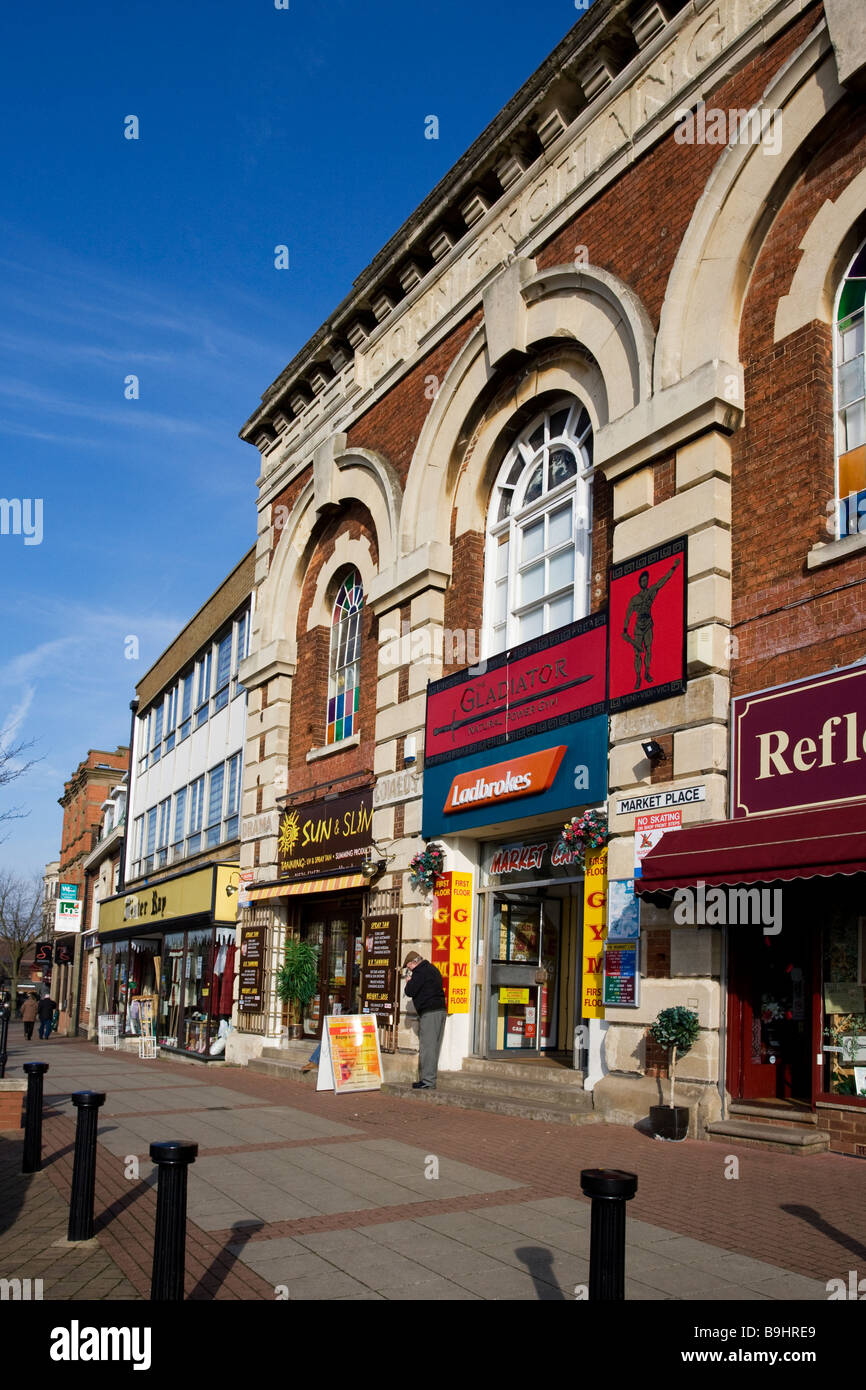 Row of shops, Market Place, Kettering, Northamptonshire, England, UK