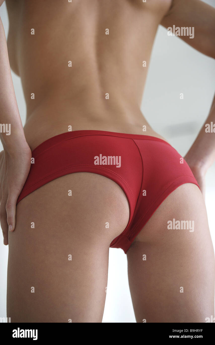 https://c8.alamy.com/comp/B9HRYF/hands-woman-young-detail-hips-fanny-underwear-panties-red-back-view-B9HRYF.jpg