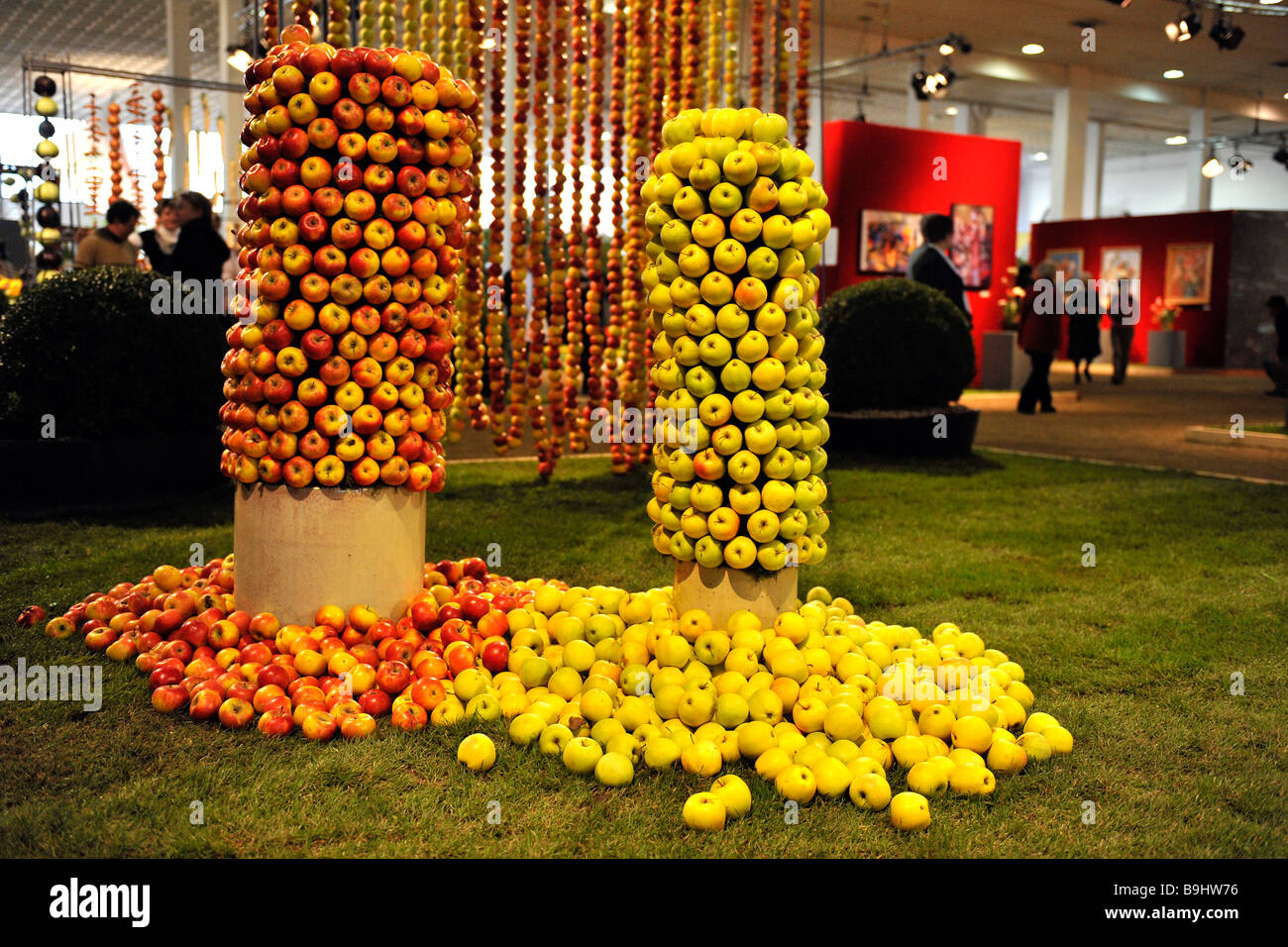 Towers made of apples on an agricultural fair called 'Gruene Woche' in Berlin, Germany, Europe Stock Photo