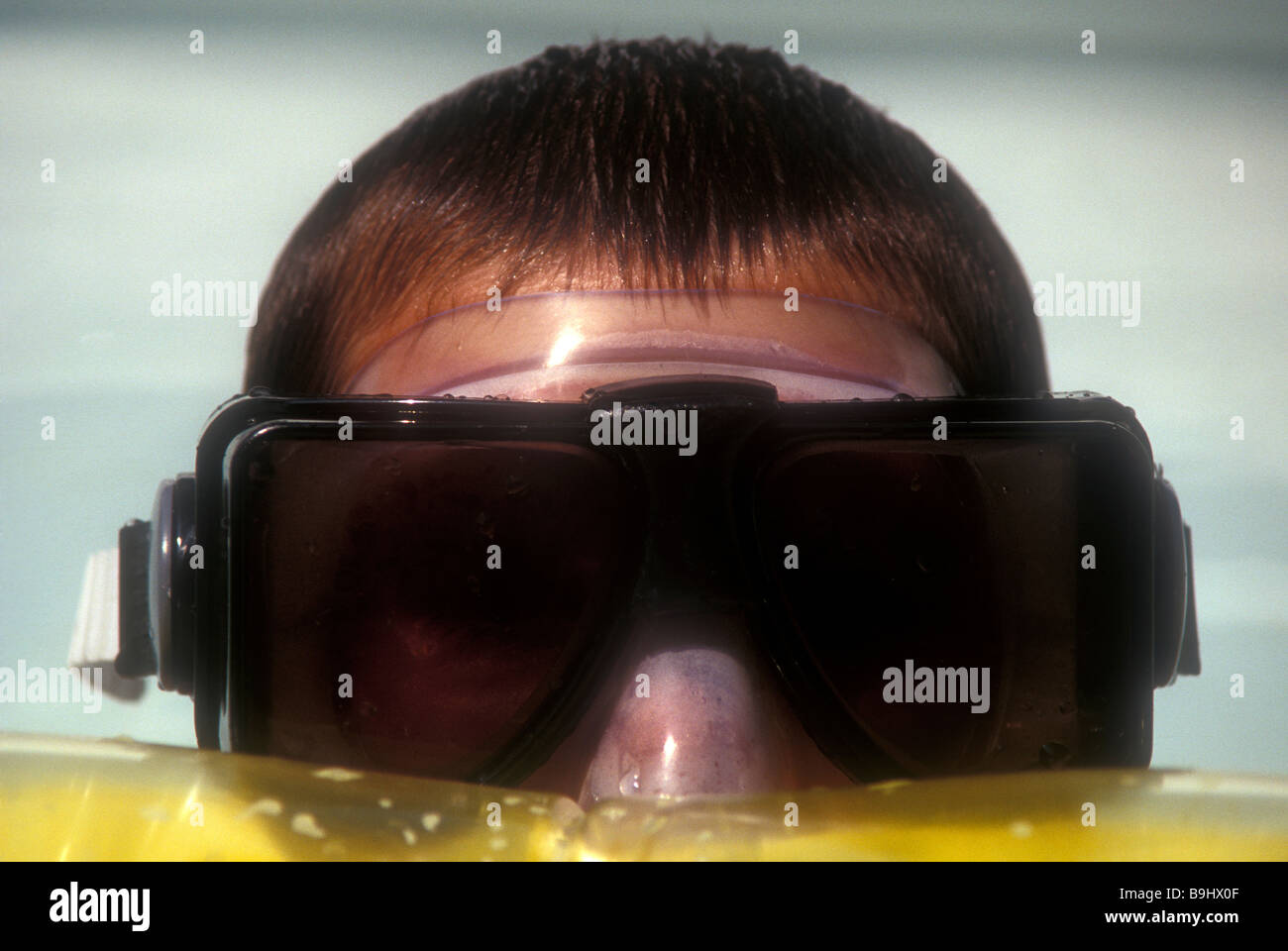 Boy wearing yellow eye mask hires stock photography and images Alamy