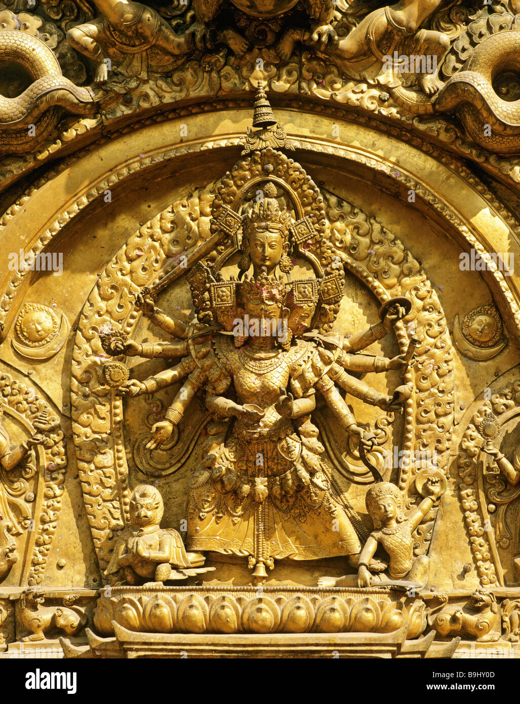 Patron goddess Taleju on the golden gate to the royal palace Lu Dhawka, Bhaktapur, Nepal, South Asia Stock Photo