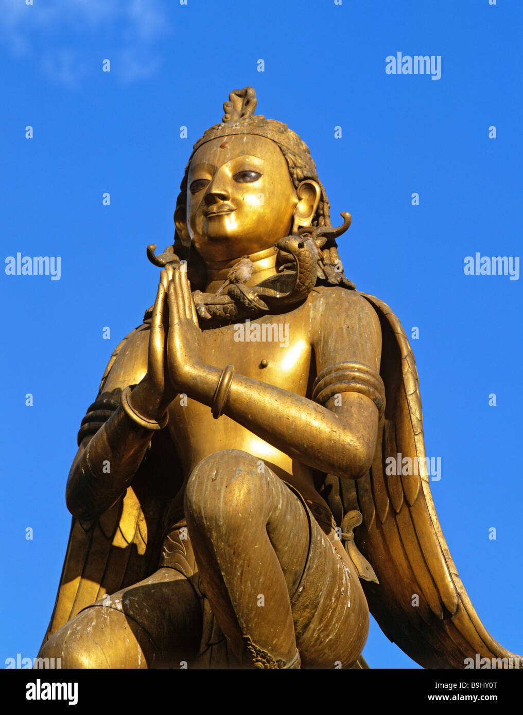 Golden statue of Garuda on a column, Durbar Square, Patan, Lalitpur, Nepal, South Asia Stock Photo