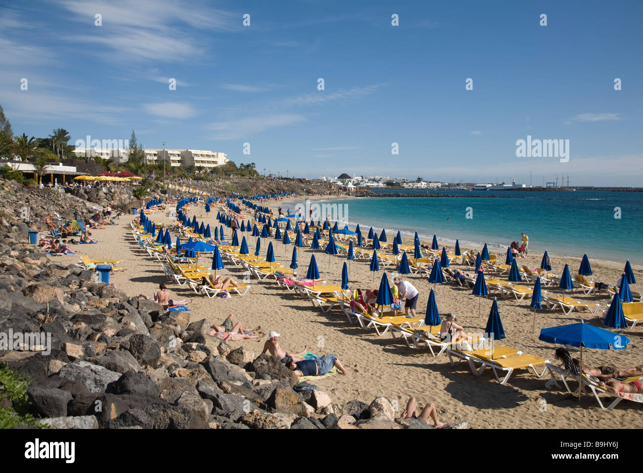 Sunbathing On The Playa Dorada At The Resort Of Playa Blanca On 