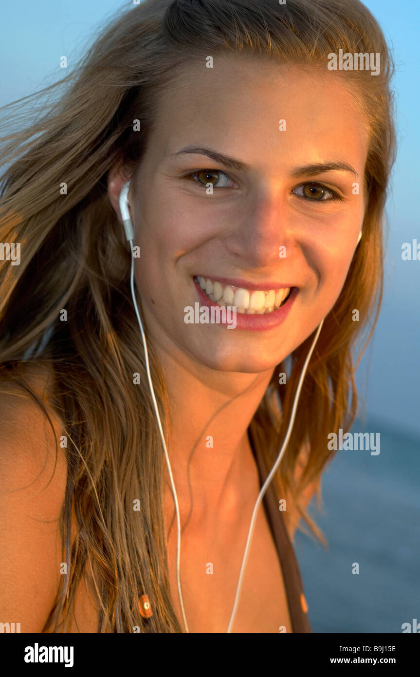 Young woman at the beach Stock Photo