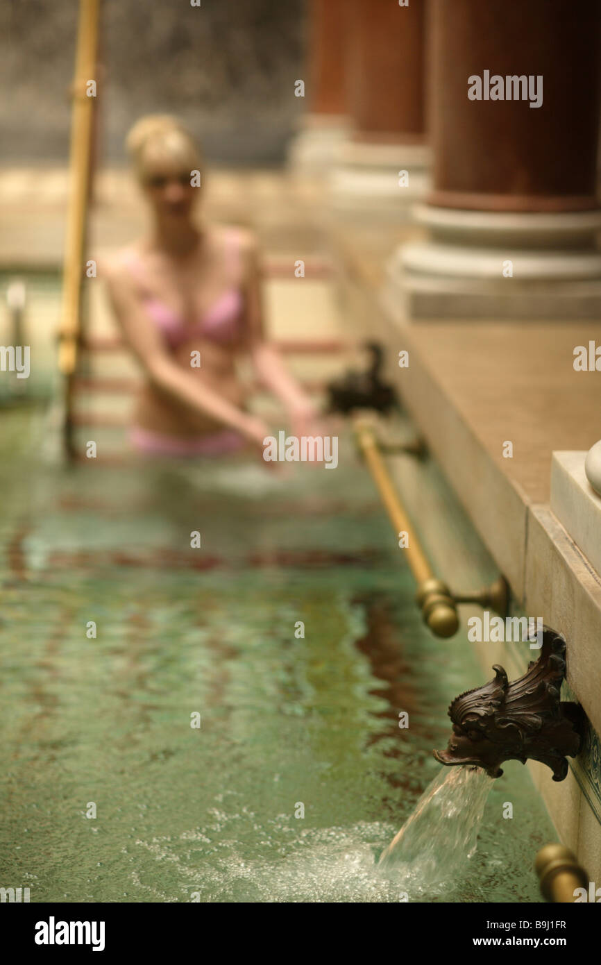 Woman in indoor pool Stock Photo