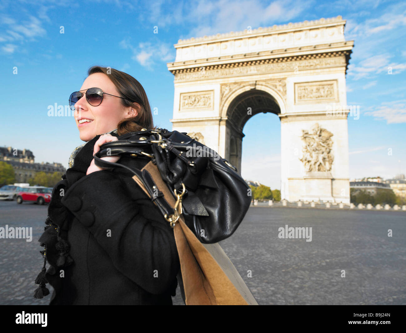 Woman walking on Champs Elysees Stock Photo