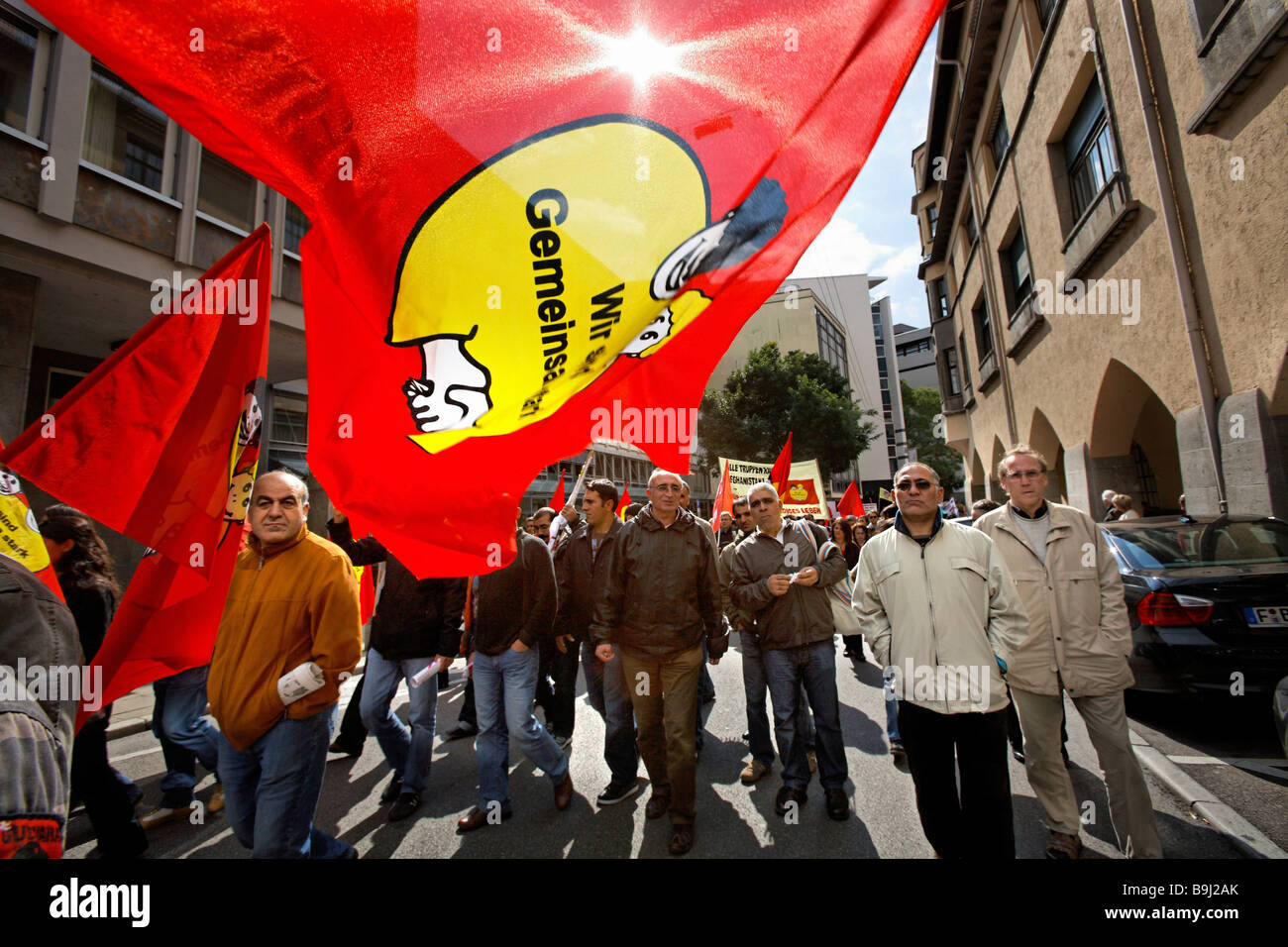 Foreign demonstrators demanding more commitment to peace and education at a demonstration, Bundeswehr raus aus Afghanistan, Ger Stock Photo