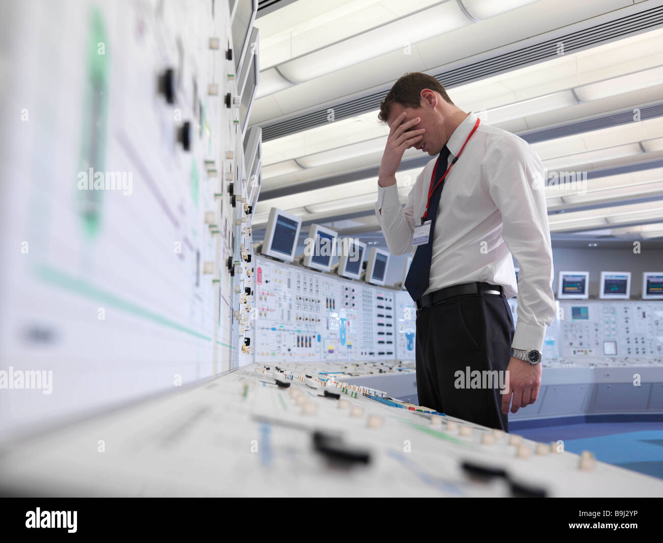 distressed-operator-in-control-room-stock-photo-alamy