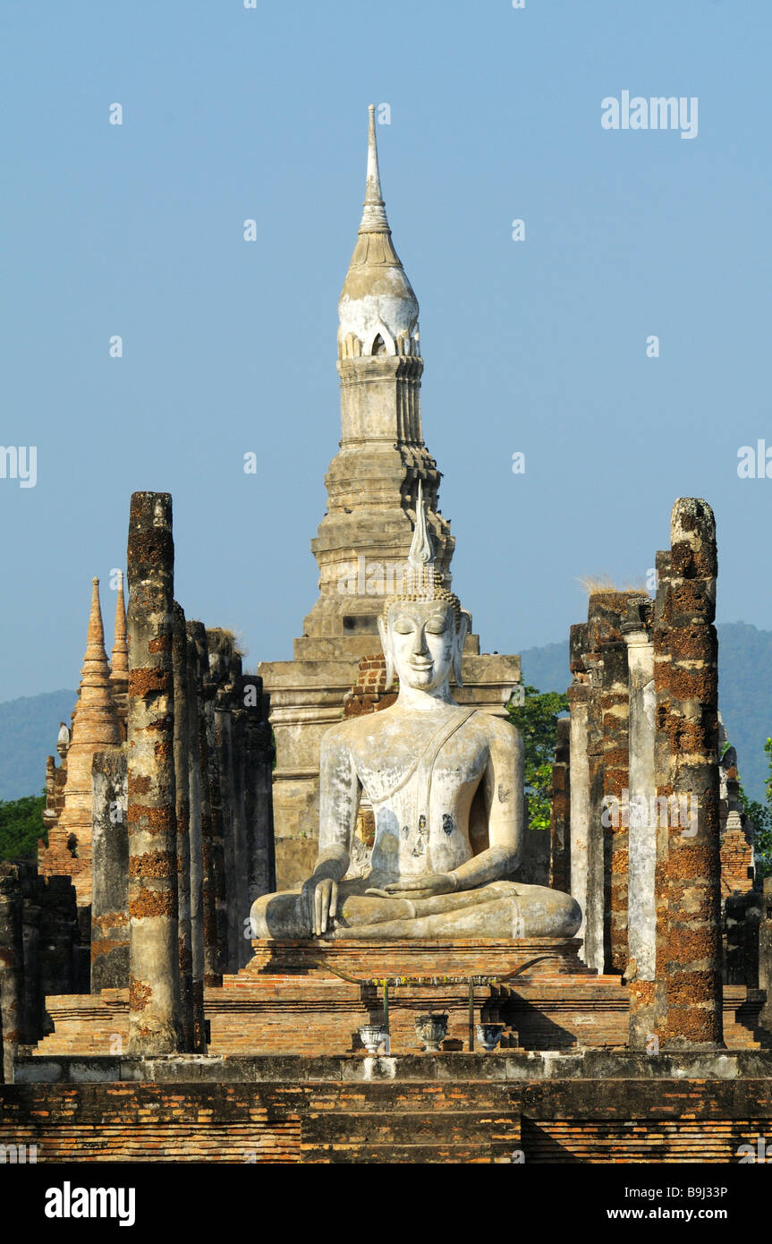 Wat Mahathat Temple and a Buddha statue in the temple of the Unesco World Heritage Site, Sukhotai, Thailand, Asia Stock Photo
