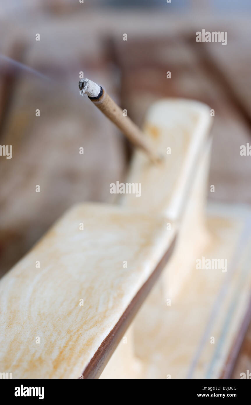 smoke-skewer holders detail incense sticks-holder mounting smoking-candle smoke-work aroma-therapy stings flavouring scent Stock Photo