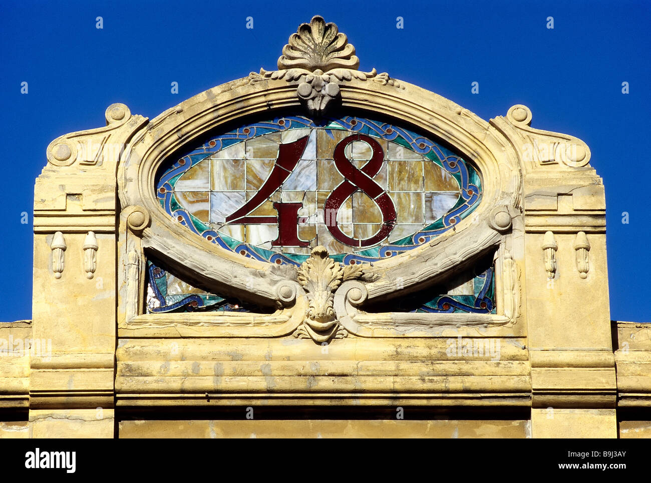 Decorative gable with the house number made of glass tiles, Art Déco