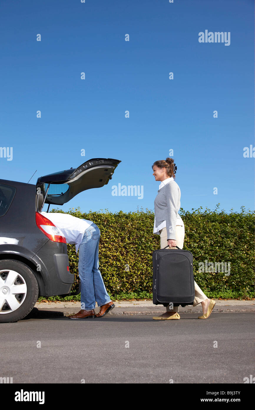 Car side view people bags hires stock photography and images Alamy