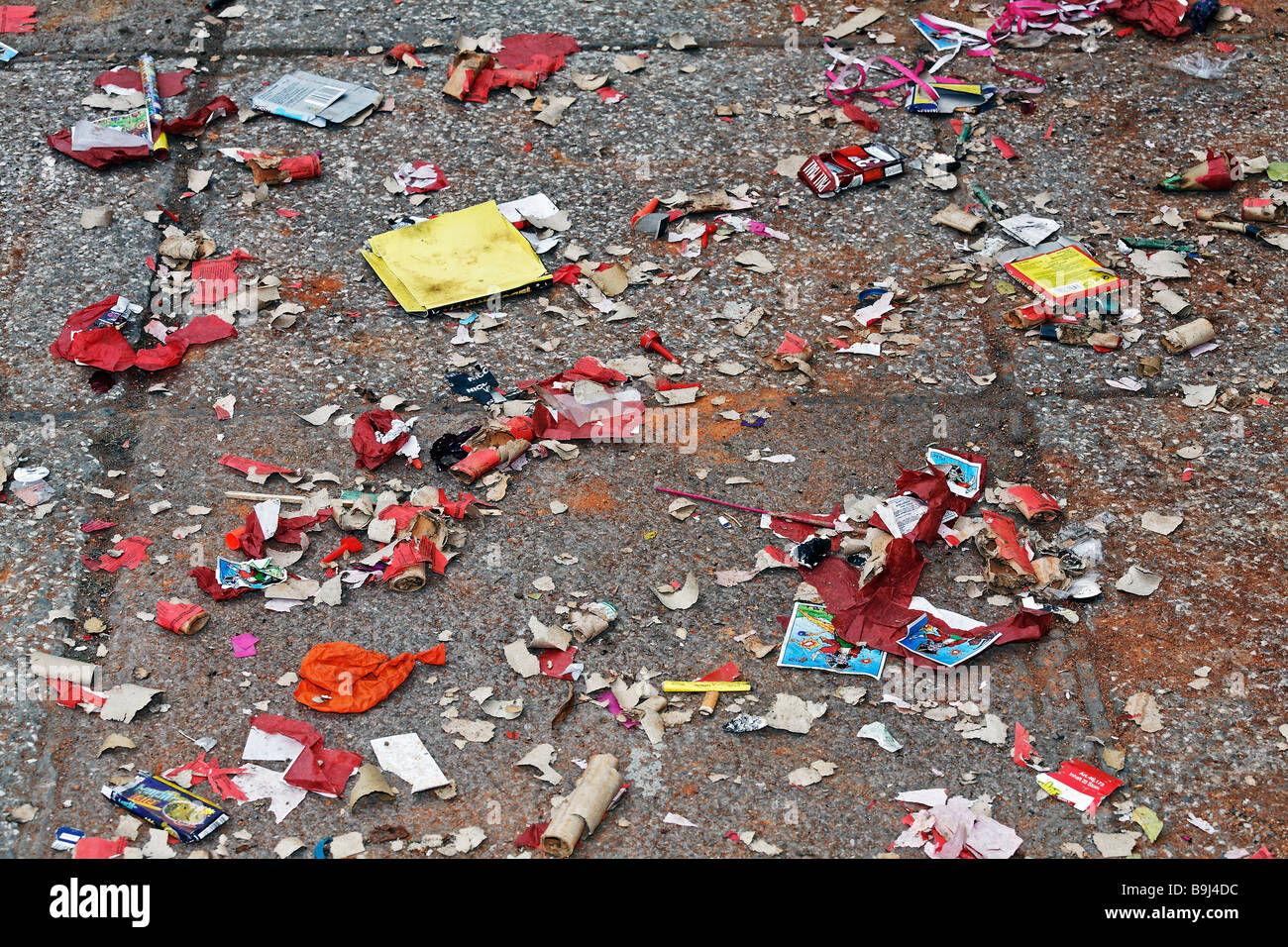 Remains of fireworks and crackers on the pavement, New Year's Eve, New Year Stock Photo