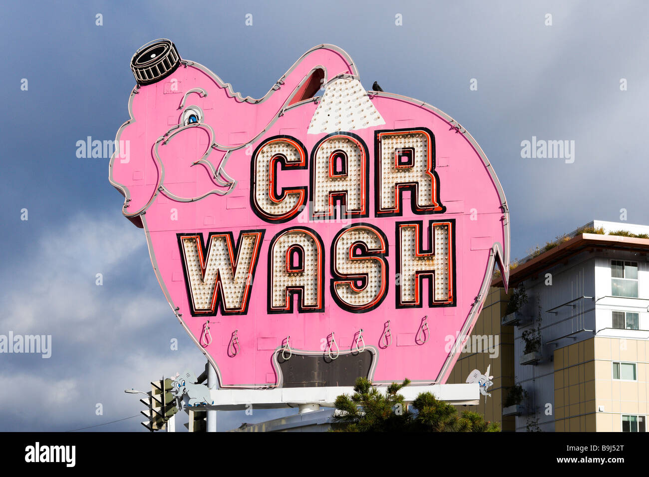 Large pink elephant outside a car wash, Seattle, Washington, USA Stock