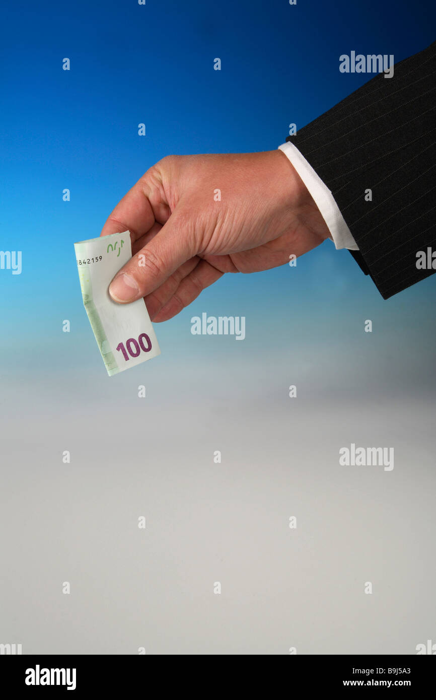 Hand holding a 100 Euro bill Stock Photo