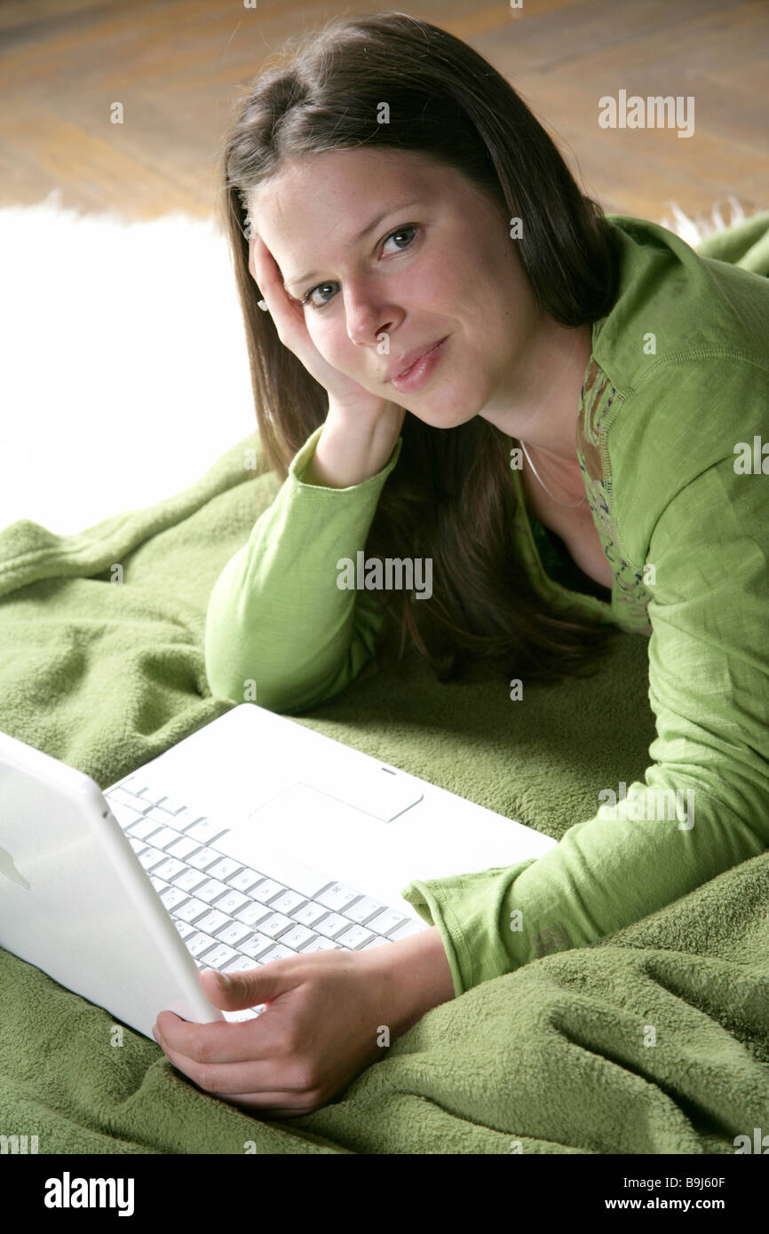 Young girl with a laptop Stock Photo - Alamy