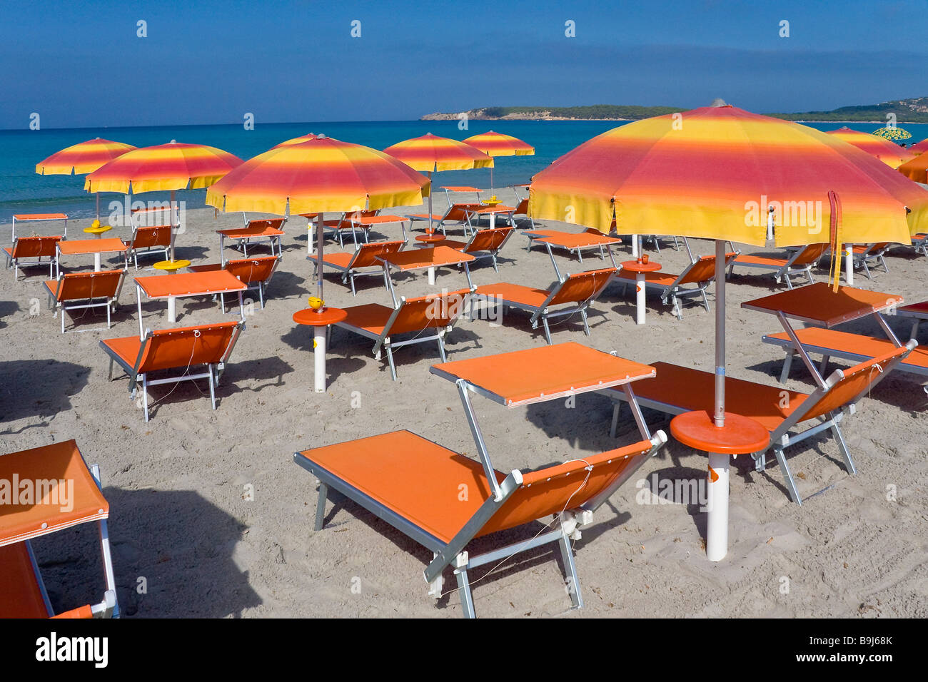 Deck chairs and sunshades on the beach of Sant'Anna Arresi, Sardinia, Southern Coast, Italy, Europe Stock Photo