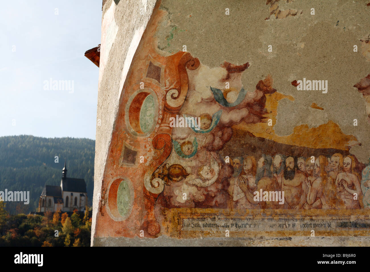 Fresco 'Zug der Seligen' on the outer wall of the St. Matthaeus town parish church, St. Matthew Church, Murau, Styria, Austria, Stock Photo