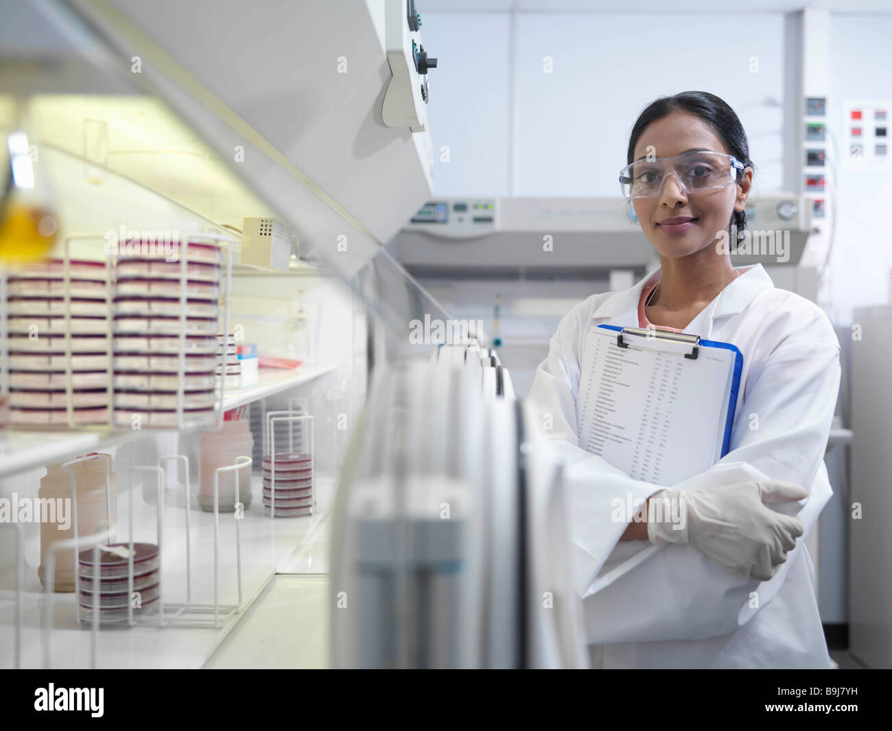 Laboratory technician with clipboard Stock Photo