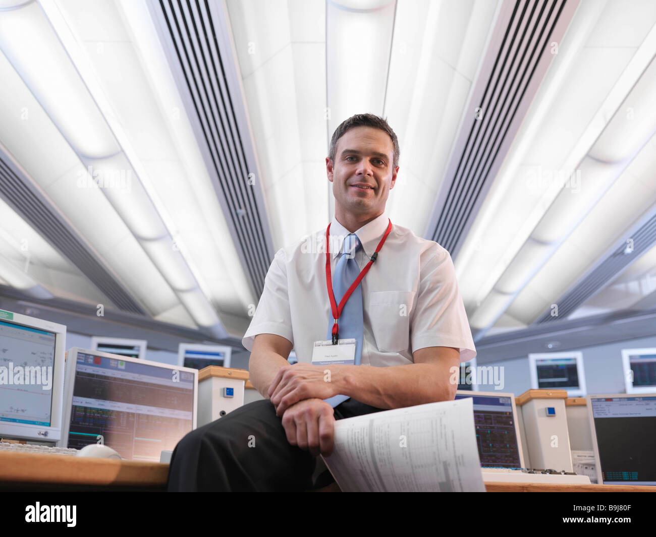 Operator in control room Stock Photo Alamy