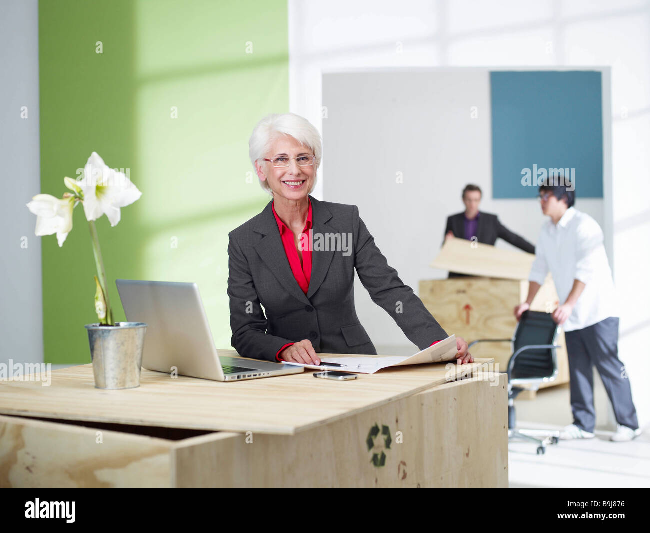 Female senior superior in new office Stock Photo