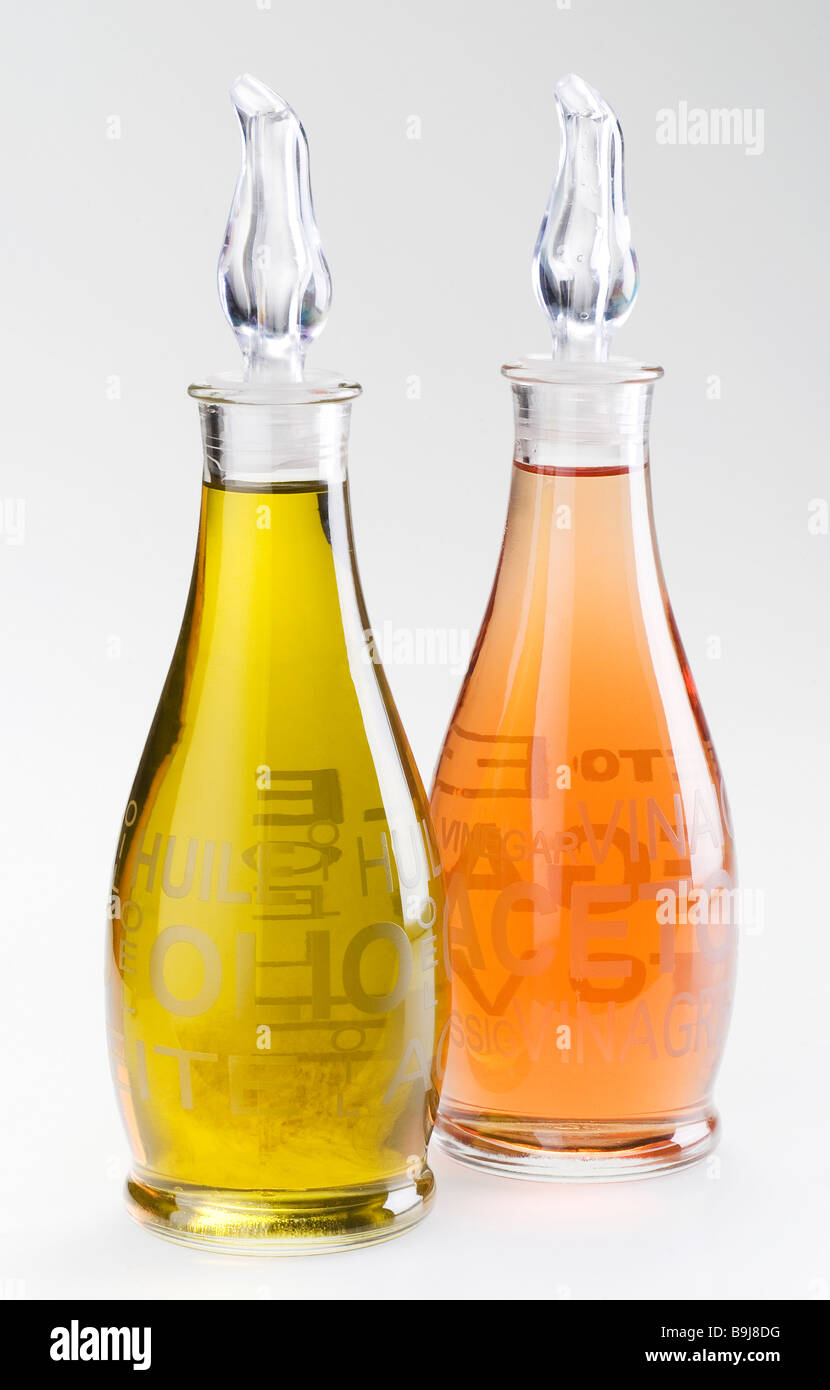 Couple of olive oil and vinegar bottles Stock Photo