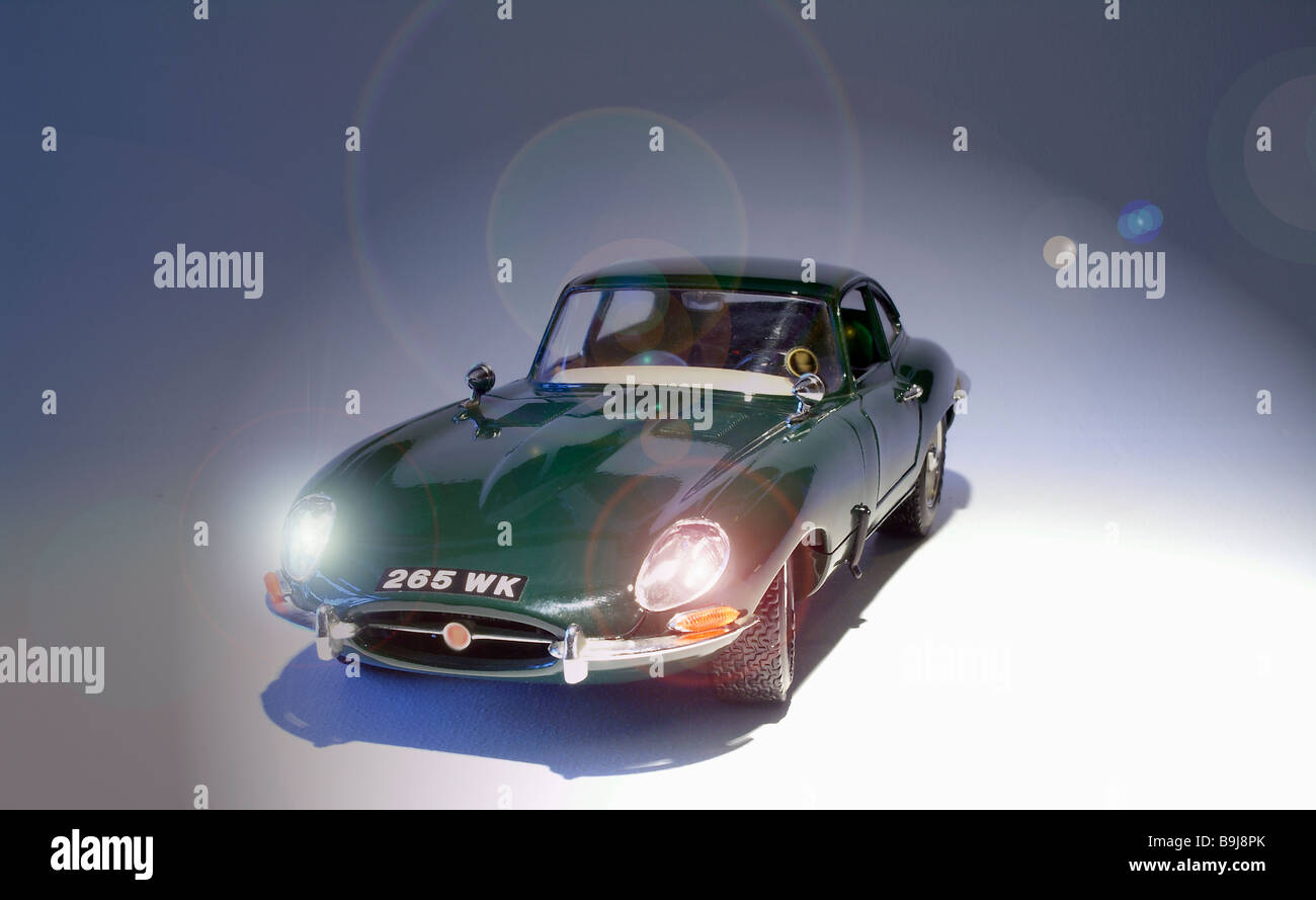 Jaguar E Type model with lights on manipulation Stock Photo Alamy