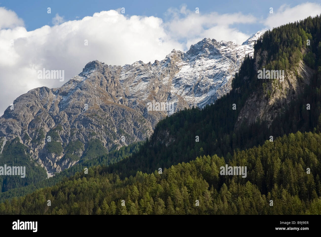 Mount Piz Zuort, 3119 metres above sea level, and wooded slopes in the Unterengadin Dolomites, Switzerland, Europe Stock Photo