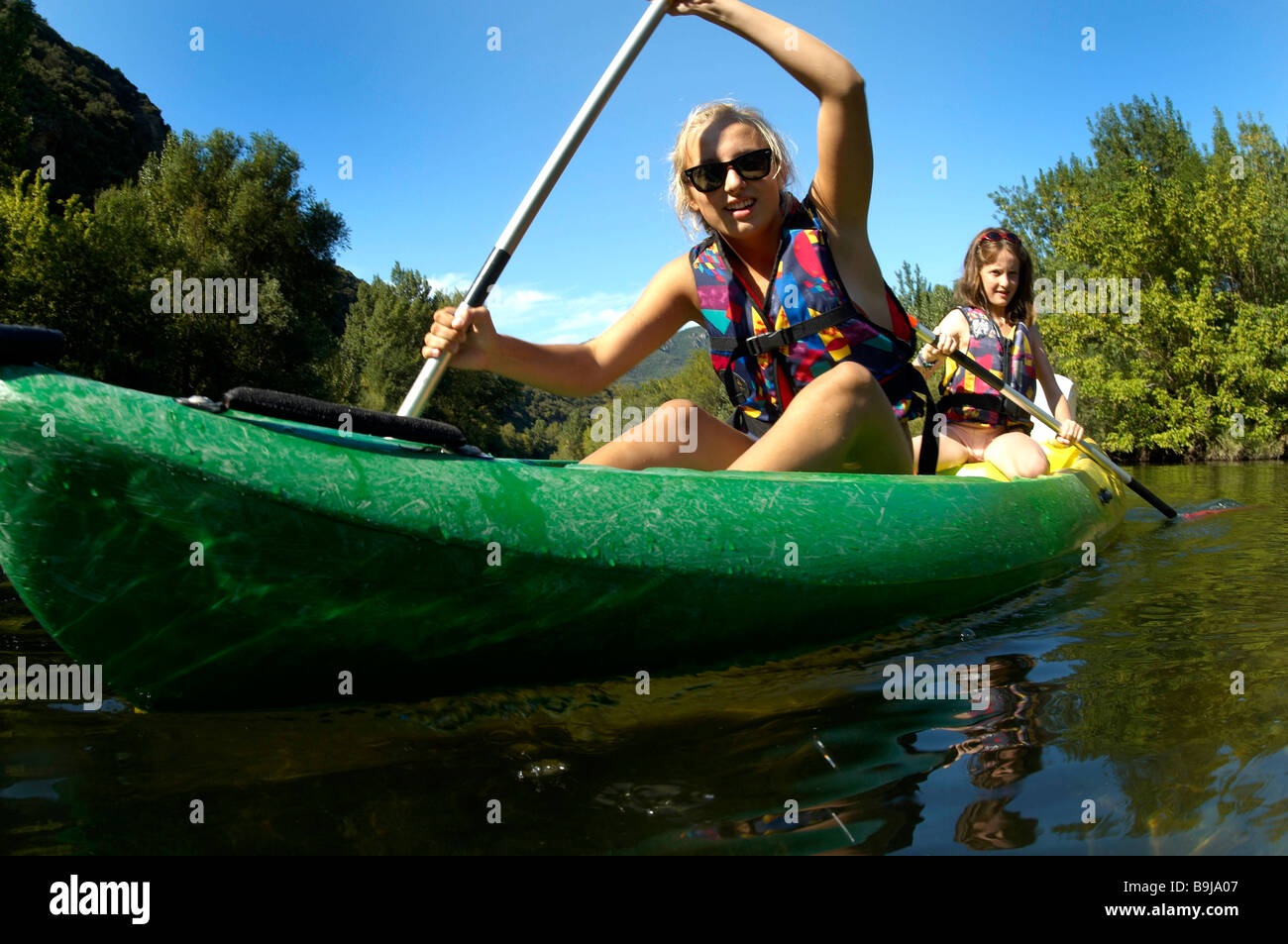 Young girl doing kayak on a river Stock Photo