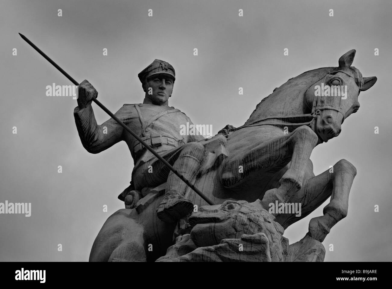A memorial statue to Poznan's Cavalry (Uhlans) shows a soldier on horseback armed with a spear, Poznan, Poland Stock Photo