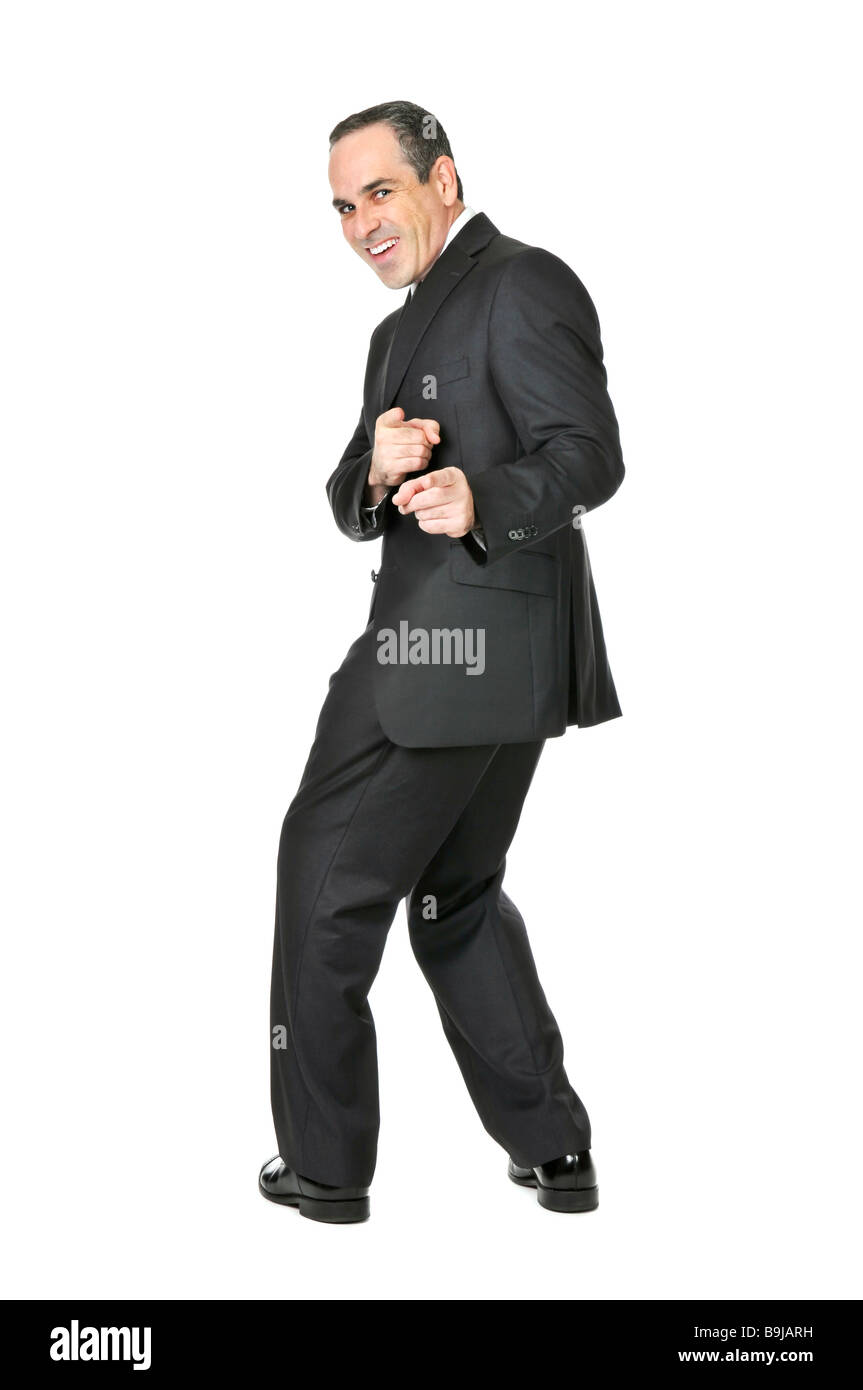 Happy businessman in a suit pointing at the viewer isolated on white background Stock Photo