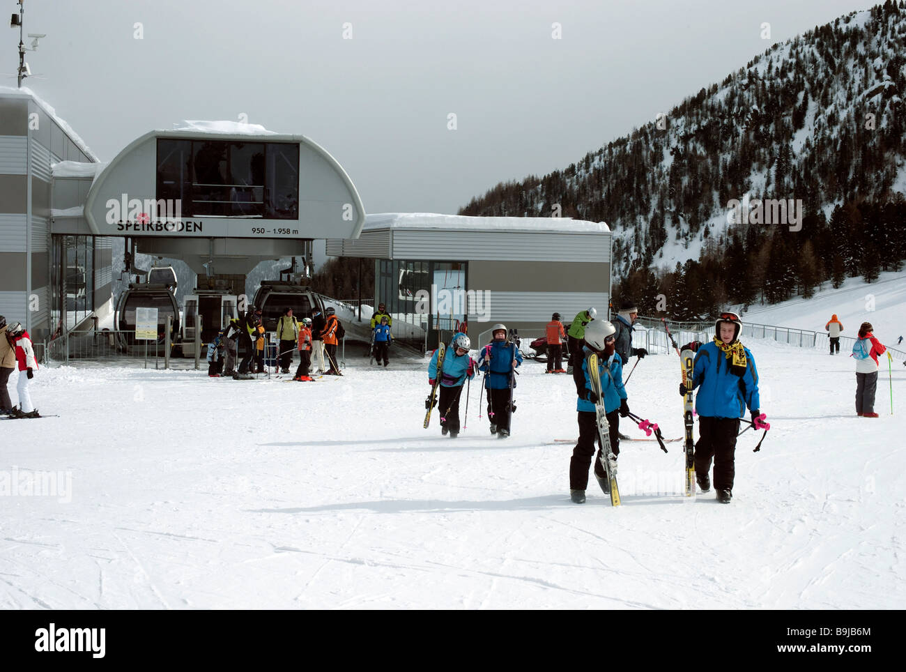 Skiers in front of cablecar, Speikboden, Ahrntal, South Tyrol, Italy, Europe Stock Photo