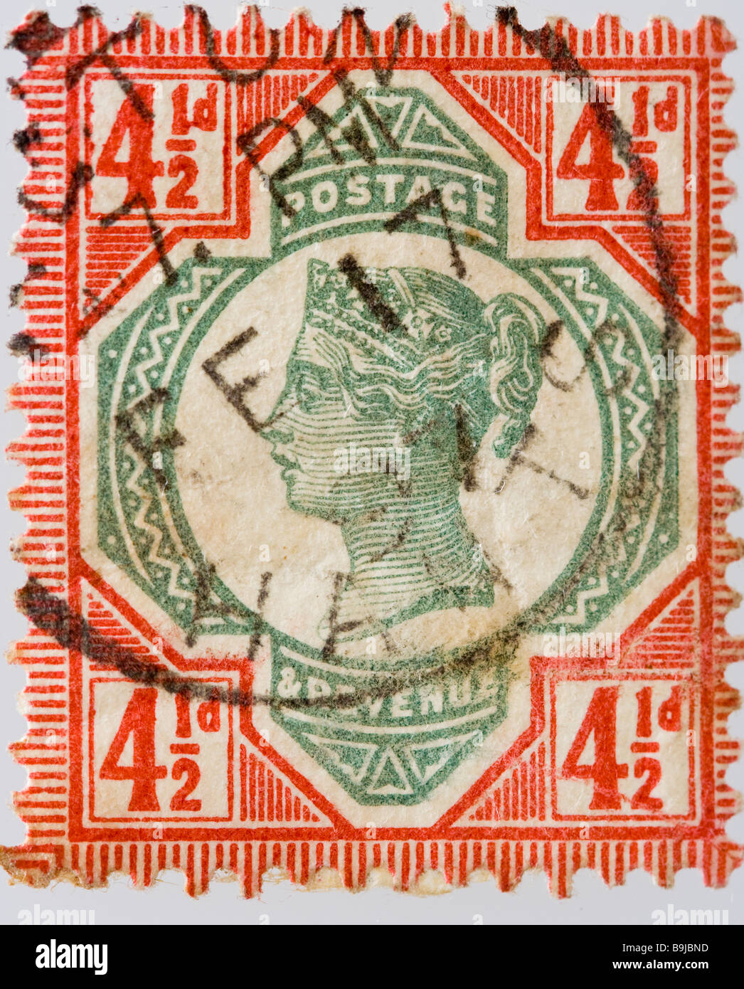 British Victorian four and half pence, 4½d postage stamp. SG 206, bright red and green, franked, used. Part of the Jubilee issue 1887-1900. Stock Photo