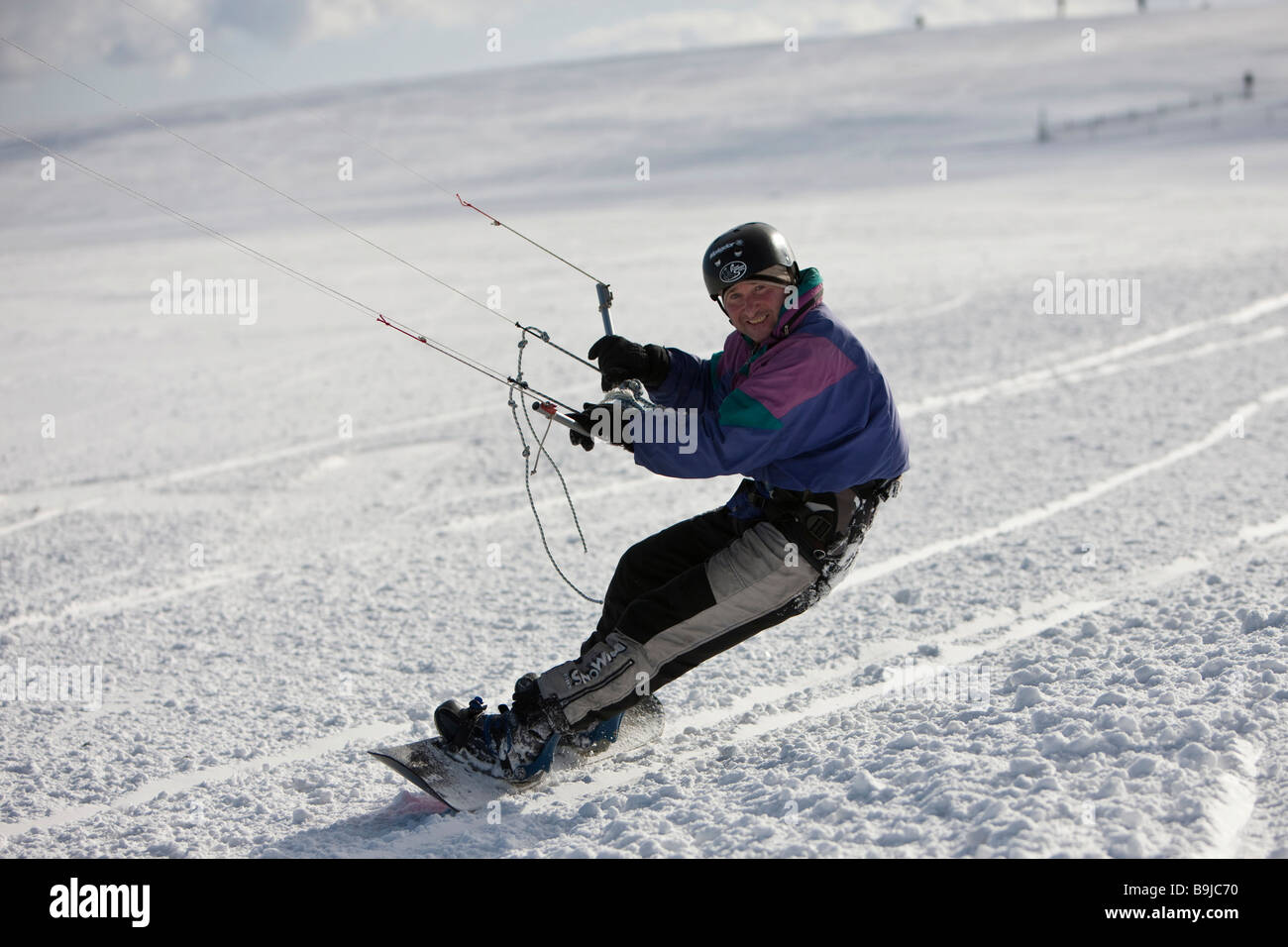 Snowkiting, snowkiter, Mount Wasserkuppe, Rhoen Mountains, Hesse, Germany, Europe Stock Photo
