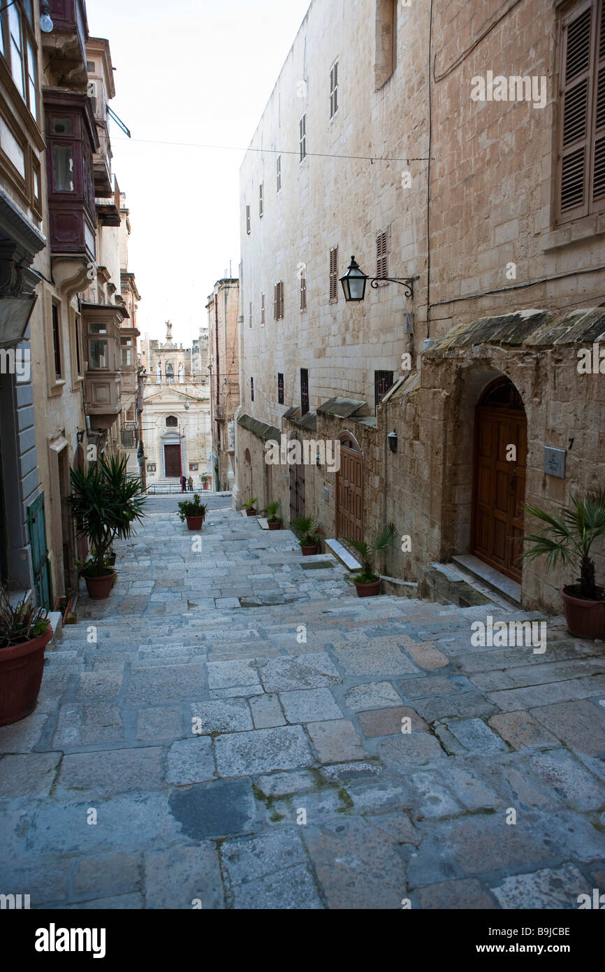 Narrow alley, St. Lucia Street, Valletta, Malta, Europe Stock Photo