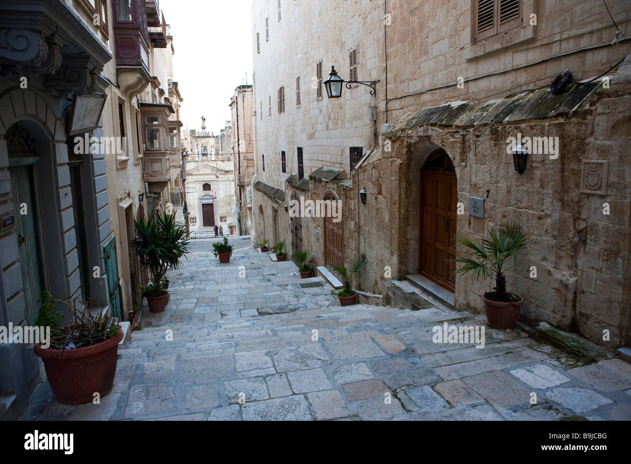 Narrow alley, St. Lucia Street, Valletta, Malta, Europe Stock Photo