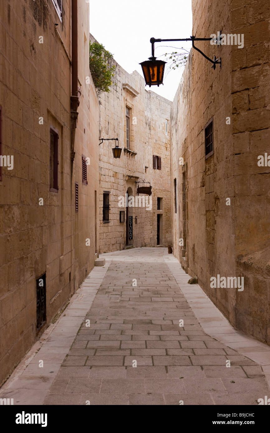 Narrow historic alley in Mdina, St. Peter Street, Mdina, Malta, Europe Stock Photo