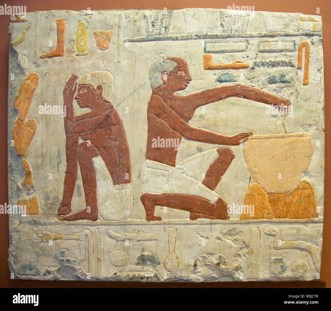 Cooking and making bread ancient egyptian painted freeze Musee du Louvre Museum Paris France Europe Stock Photo