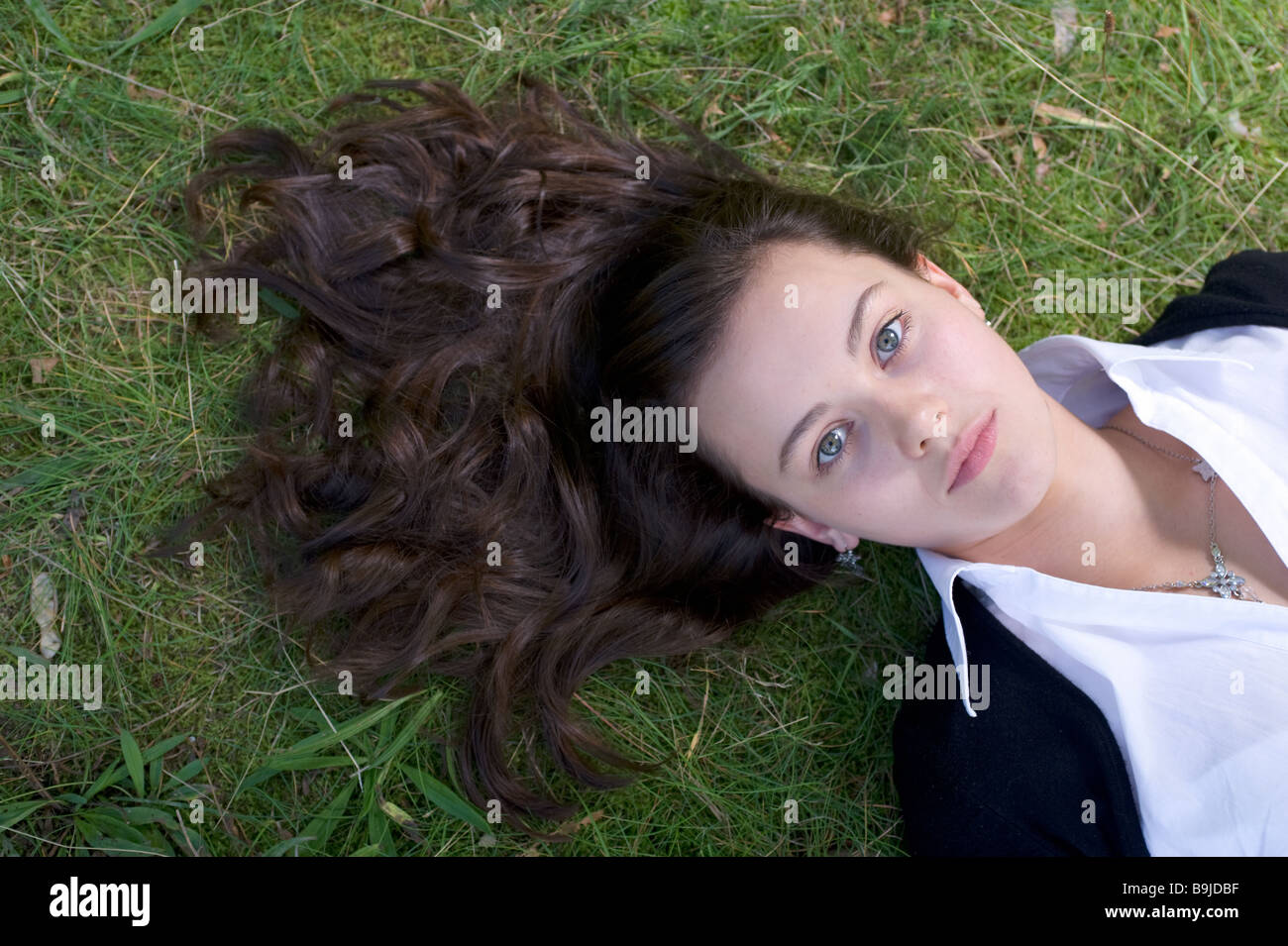 young woman relaxing in the park Stock Photo - Alamy