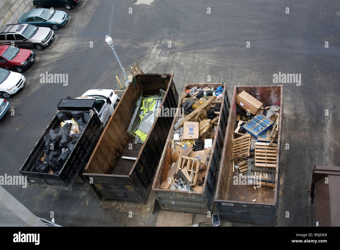 Birds eye view of trash containers in carpark Stock Photo
